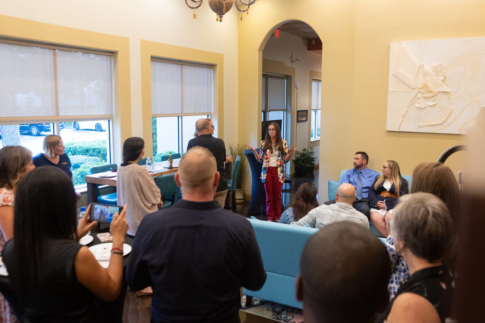 Kristin Rink Ketler leading a room of attendees
